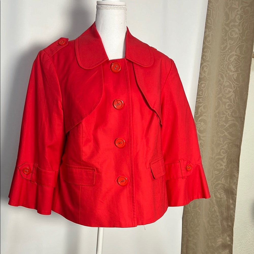 Striking Red Trench Coat with Flared Sleeves and Wide Collar